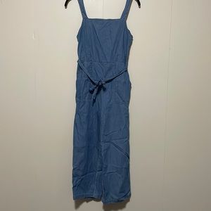 Jean jumpsuit with tie around waist and pockets